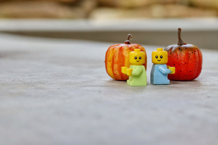 A close-up shot of lego toy figures standing outdoors.の写真素材