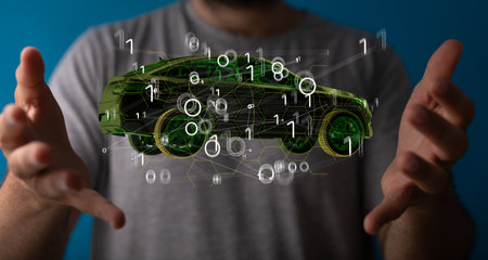 A 3D rendered green digital car above the hands of a male in the backgroundの写真素材