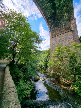 A large bridge over a stream in Edinburghの写真素材