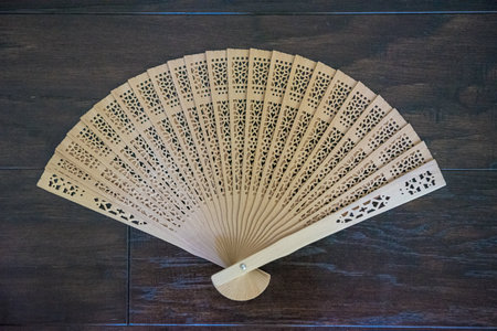 A closeup shot of a wooden fanの写真素材