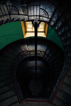 A closeup of spiral stairway of a buildingの写真素材