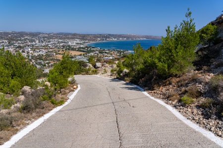 An asphalt road leading to the beach in the Kos Island in the Aegean Sea in Greece