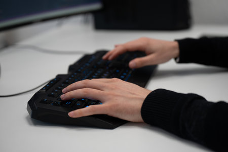 Office worker working frantically with computer