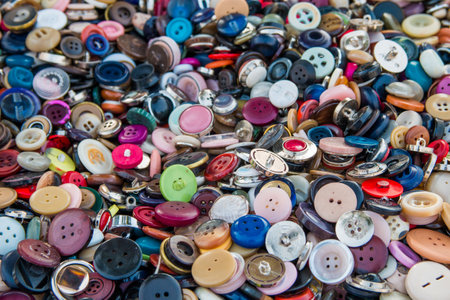 A closeup shot of a heap of colorful buttonsの写真素材