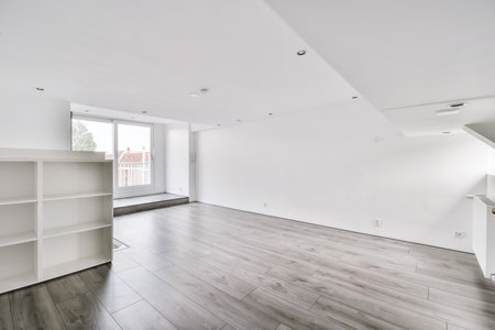 The interior of a white room with windowsの写真素材