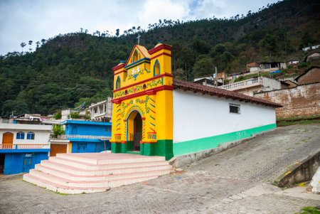 Colour facade of the church in the San Andres Xecul in Guatemalaの写真素材