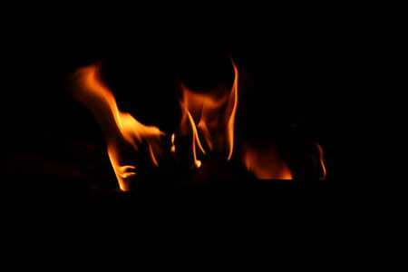 A fire flaming in the darkness