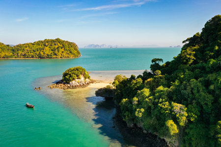 A beautiful view of nature with a calm, blue sea and islands in Thailandの写真素材