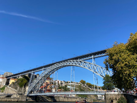 The view of D. Luis bridge against the background of blue sky. Porto, Portugal.