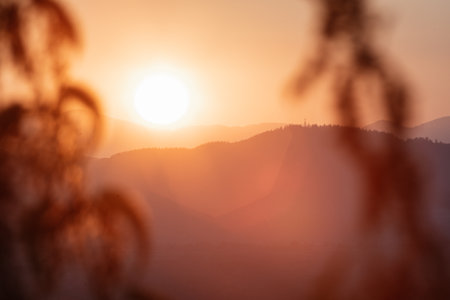 A selective of the sun during the sunsetの写真素材