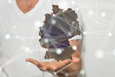 A 3D rendering of digital Germany map floating on human hands- internet and global connection conceptの写真素材