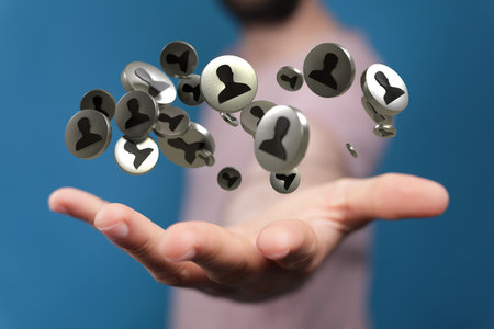 A 3D rendering of digital human icons with hand pointing at it from the background- digital business communication conceptの写真素材