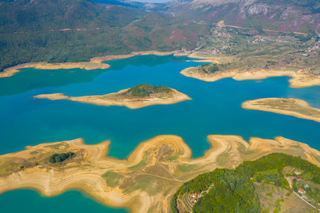 An aerial view of a Ramsko Lake, small islands, and peninsulas in Bosnia and Herzegovinaの写真素材