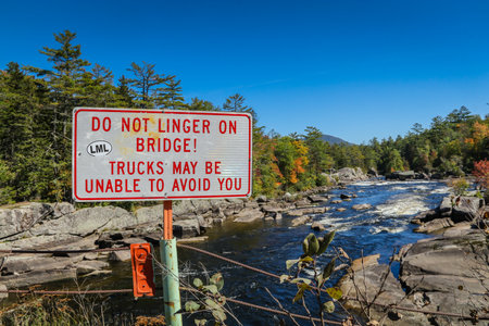 A warning signpost in the Baxter State Parkの写真素材
