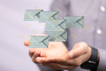 A 3D rendering of a group of floating people icons on a businessman's handの写真素材
