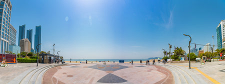 A panoramic shot of the East Sea coast - Haeundae-gu in Busan, South Korea on a sunny dayの写真素材