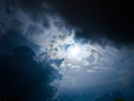 A low angle view of sunlight in the dark gloom