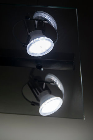 LED lamp lit modern office interior technology.