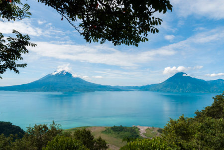 Panoramic view of volcano and lake Atitlan, surface: 130.1 km2, length: 12 km, elevation the surface: 1,562 mの写真素材