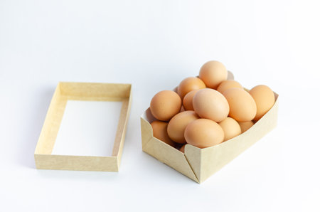 A box of frsh eggs isolated on a white background