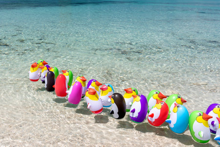 A view of penguin toys in the clear transparent sea