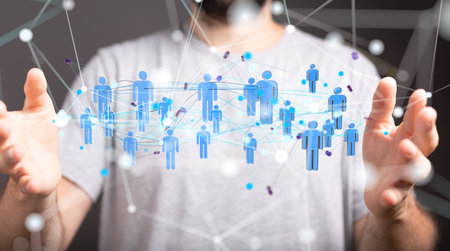 A 3D rendering of a group of floating people icons on a businessman's hand