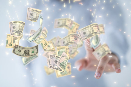 A human hand showing 3D rendered dollar banknotes flying in the air