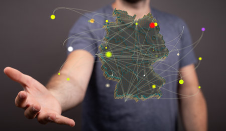 A 3D rendering of digital Germany map floating on human hands- internet and global connection conceptの写真素材
