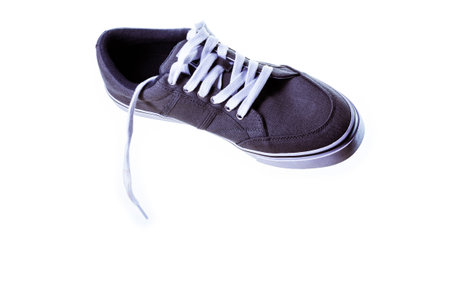 A high angle illustration of a shoe in the air on a white background.の写真素材