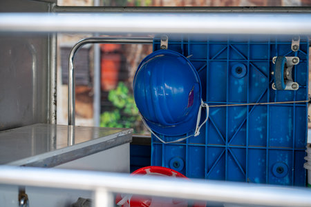 Hard hat, blue safety helmet on a truck. Horizontal shot