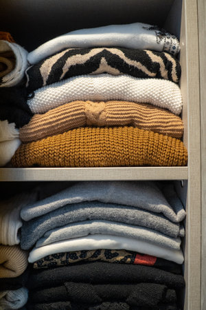 A vertical shot of folded clothes