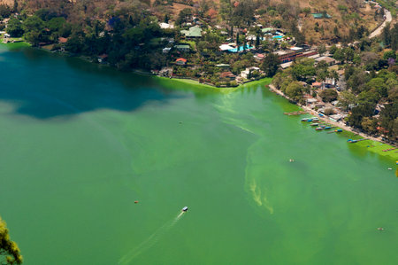 The lake of Amatitlan is a crater lake located in Guatemala. It is located 25 km from Guatemala City, today is a drain of the city totally contaminateの写真素材