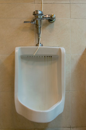 sanitary for men, urinal in public area in Guatemala, central america.