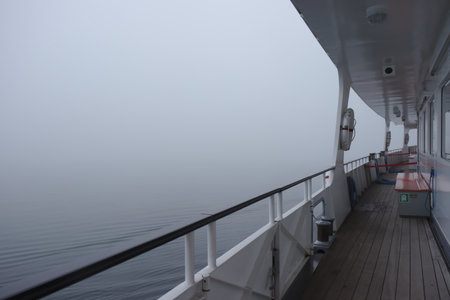 The view out of the ship into thick fog.