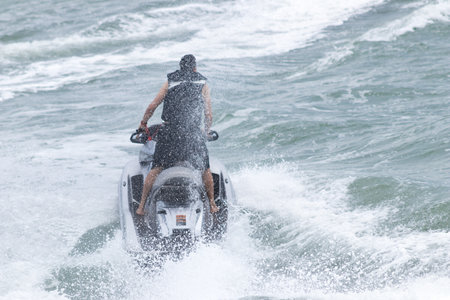 The man on the motorboat. Jet skiing.の写真素材