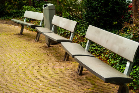 A row of concrete bench in the park