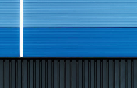 An abstract metal wall in blue and black colors with copy space for your textの写真素材