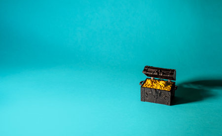 A box full of gold on a blue backgroundの写真素材