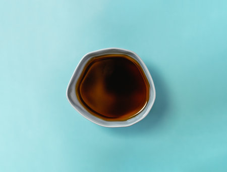 A mug of coffee on a blue backgroundの写真素材