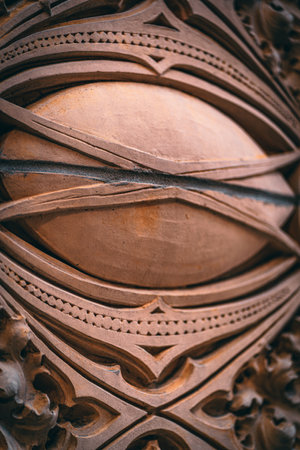 A vertical shot of an old wood carved furnitureの写真素材