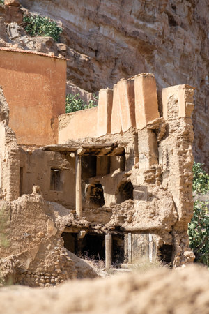 Scenic view of Old stone houses, Palm trees Oasis , Mountains from Ghoufi Canyon in the Aures region, Algeriaの写真素材