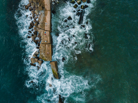 An aerial shot of the rocks at the Malecon of Santo Domingo in the Dominican Republicの写真素材