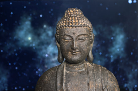 Buddha with the infinite universe as a background for calm and tranquility.