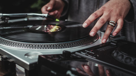 The DJ playing during the incredible partyの写真素材