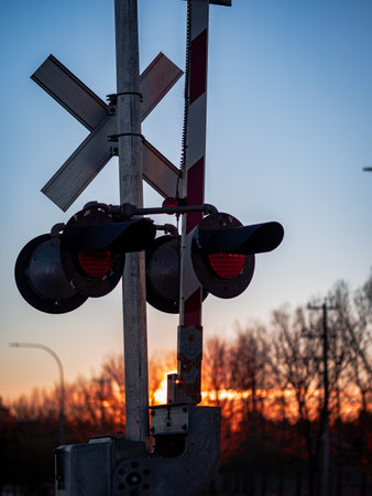 A vertical shot of railway crossing mechanism in Airdrie, Albertaの写真素材