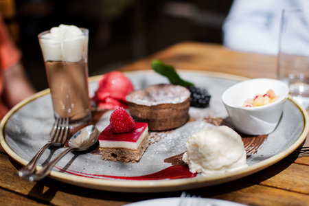 A closeup of a plate with delicious desserts