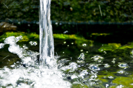 A closeup shot of splashing spring waterの写真素材