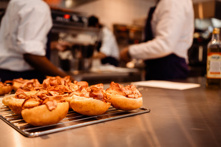 A selective focus shot of chefs preparing sandwiches in the cafe kitchenの写真素材
