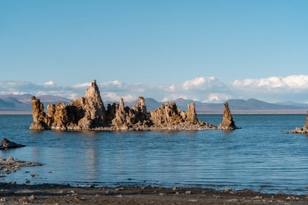 The beautiful view of Tufa Towers over the Mono Lake with mountain background in USAの写真素材