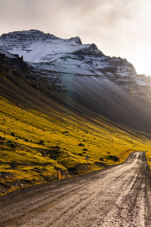 A vertical shot of a road in the mountainsの写真素材